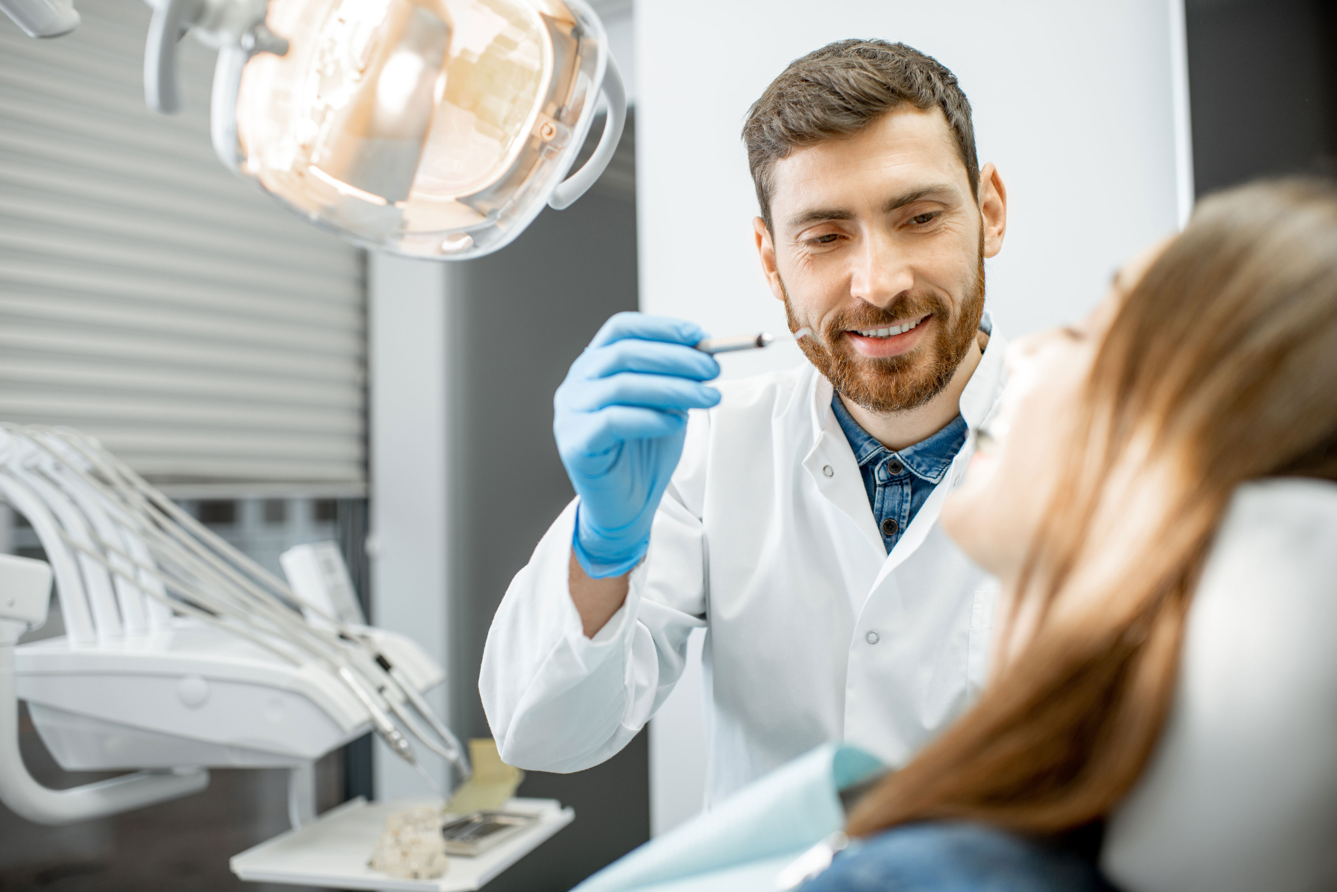 dentist-giving-oral-cancer-screening