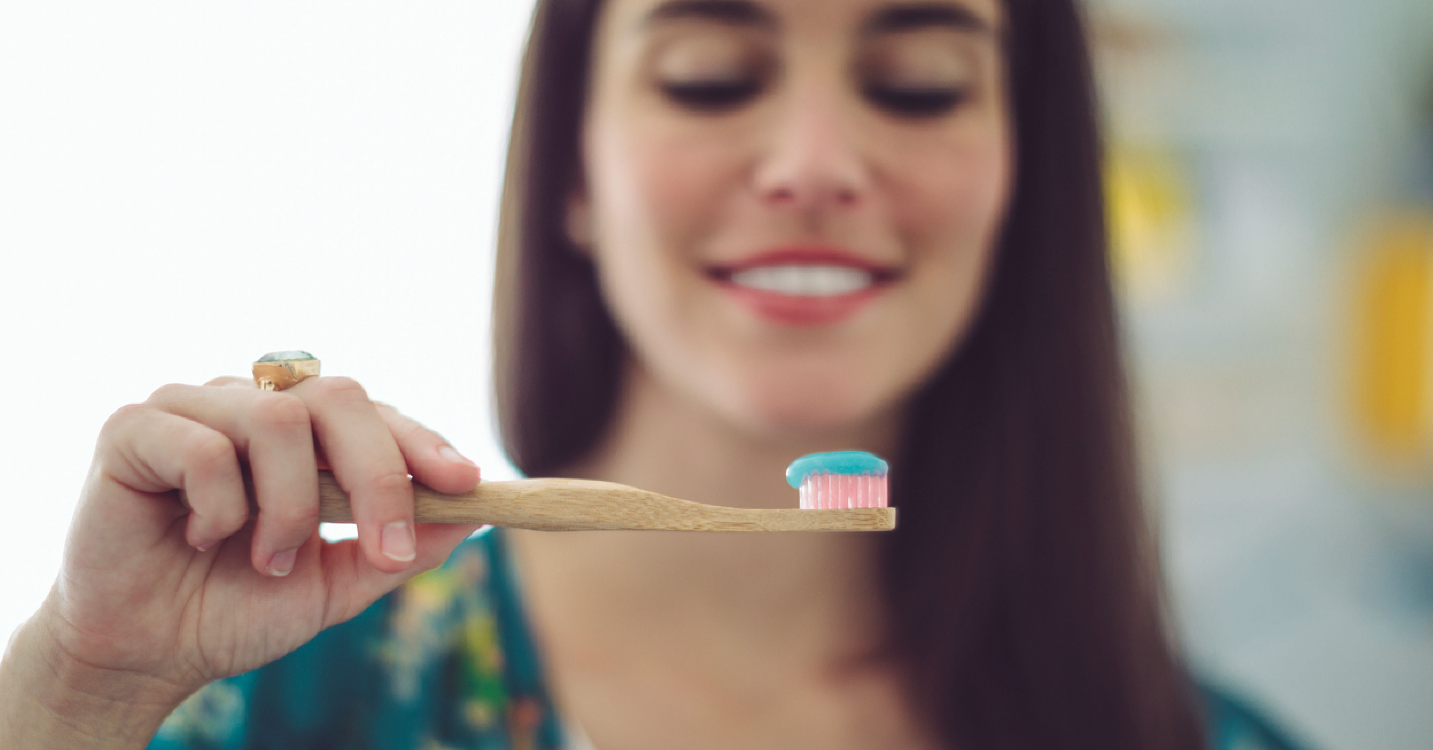 woman brushing teeth